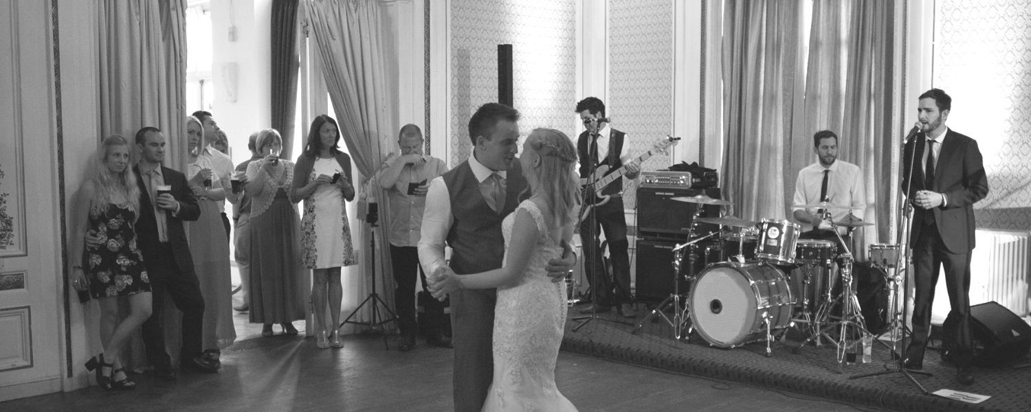 Band performing first dance at a wedding